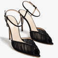Black high-heeled shoes with mesh details on a white background, Obroi