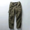 Green cargo pants on a light gray background, Obroi