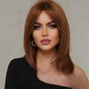 Woman with styled hair and makeup, wearing a black top, with 'Obroi' brand name, Obroi