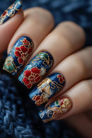 Nails with blue, red, and gold floral design, Obroi