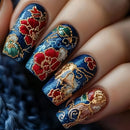 Nails with blue, red, and gold floral design, Obroi