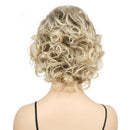 Blonde curly wig on a mannequin head against a white background, Obroi