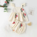 Children's dress with floral embroidery on a white background, Obroi