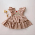 Beige dress with floral embroidery on a light background, Obroi