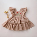 Beige dress with floral embroidery on a light background, Obroi