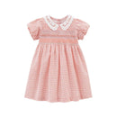 Pink dress with white lace collar on a white background, Obroi