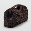 Brown woven handbag on a light gray background, Obroi
