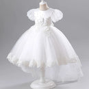 White lace dress on a mannequin against a gray background, Obroi