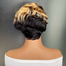 Mannequin head with a styled wig featuring black and blonde hair on a gray background, Obroi