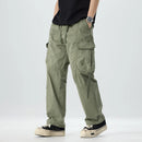 Person wearing olive green cargo pants on a white background, Obroi