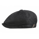 Black flat cap on a white background, Obroi