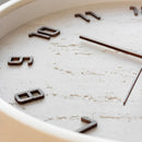 Close-up of a clock face with worn numbers and hands, Obroi