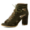 Brown lace-up heeled shoe with gold studs on a white background, Obroi