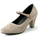 Beige high-heeled shoe with a strap on a white background, Obroi