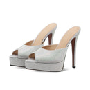 Silver high-heeled shoes with platform on a white background, Obroi