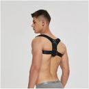 Man wearing a black posture corrector on a plain background, Obroi