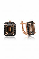 Pair of rose gold earrings with smoky gemstones on a white background, Obroi