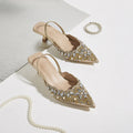Pair of embellished high-heeled shoes on a light background, Obroi