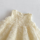 White lace dress with floral patterns on a light gray background, Obroi