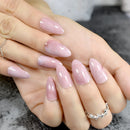Hand with pink nail polish on a neutral background, Obroi