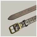 Brown leather belt with gold buckle on a light gray background, Obroi