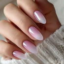 Close-up of a hand with pink and white gradient nail polish on a neutral background, Obroi