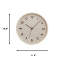 A round wall clock with a light beige textured face and frame, dark brown numerals and hands, shown on a white background with black dimension arrows labeled 11.8 inches wide and tall, Obroi
