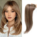 Woman with styled hair next to a hair extension on a white background, Obroi