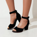 Black high-heeled sandals with ankle straps on a white background, Obroi