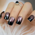 Nails with black and rose gold gradient design on a neutral background, Obroi