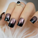 Nails with black and rose gold gradient design on a neutral background, Obroi