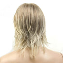 Blonde wig on a mannequin head against a white background, Obroi