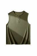 Green sleeveless shirt with buttons on a white background, Obroi