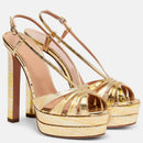 Gold high-heeled platform sandals on a white background, Obroi