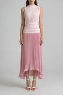 Pink dress with a pleated skirt on a gray background, Obroi