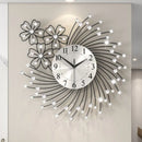 Decorative wall clock with floral design on a light wall, Obroi