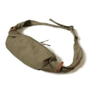 Green waist bag with a strap on a white background, Obroi
