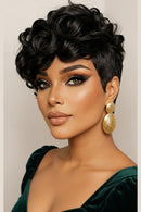Woman with stylish black hair and makeup, wearing gold earrings, Obroi