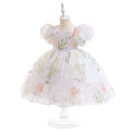 Floral dress on a mannequin against a white background, Obroi