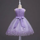 Purple lace dress with a bow on a mannequin against a dark background, Obroi