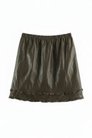 An olive green A-line mini skirt with an elastic waistband and a double-tiered ruffle hem, shown flat against a white background, Obroi