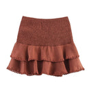 Brown skirt with ruffled layers on a white background, Obroi