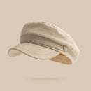 Beige cap on a beige background, Obroi