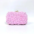 Pink floral clutch bag on a white background, Obroi