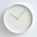 White wall clock with green hands on a white background, Obroi