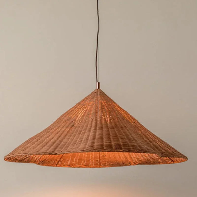 Woven pendant light with a textured design on a plain background
