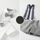 A four-panel product collage showing a children's outfit detail set: a white collared shirt with a gray patterned bow tie, navy suspenders with white stripes, and gray plaid shorts. A central black circle contains  , overlays the middle of the collage, Obroi