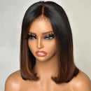 Mannequin head with a brown wig on a plain background, Obroi