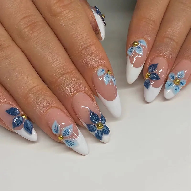 Nails with floral design on a white background