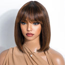 Mannequin head with a styled wig on a white background, Obroi